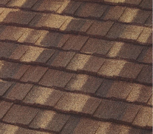 A close up of a brown shingle roof