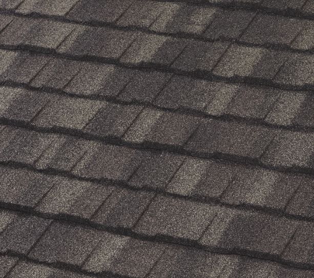 A close up of a roof with shingles on it