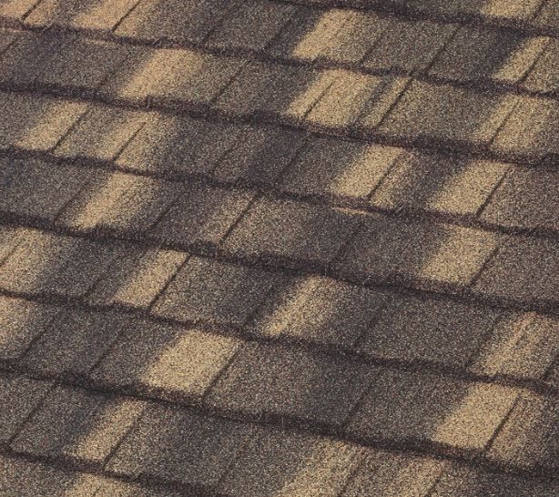 A close up of a roof with shingles on it