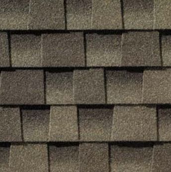 A close up of a roof with shingles on it.