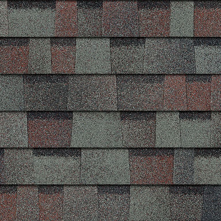 A close up of a row of shingles on a roof.