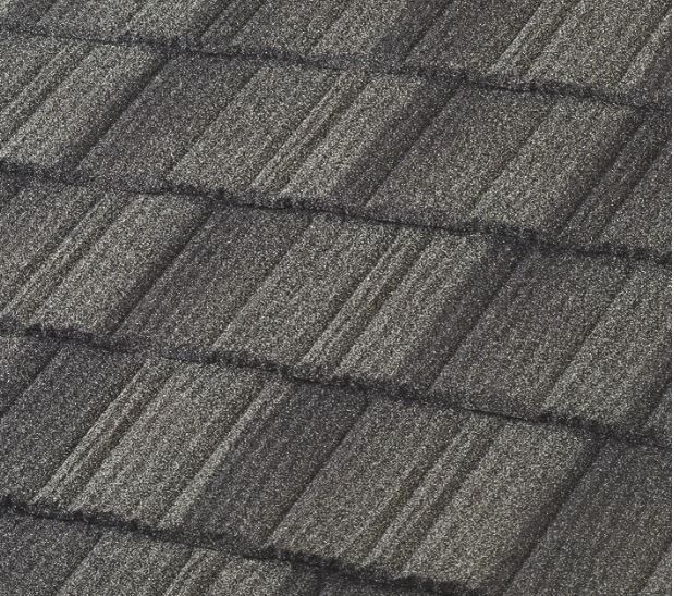 A close up of a gray tile roof