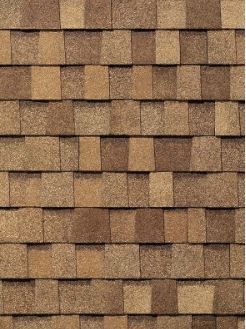 A close up of a roof made of wooden tiles.