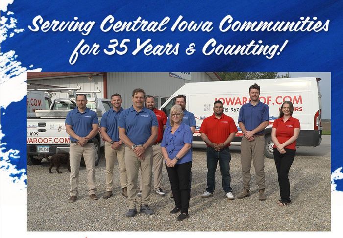 A group of people standing in front of a van.