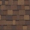 A close up of a wooden shingle roof.