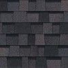 A close up of a black shingle roof.
