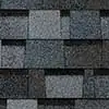 A close up of a row of black tiles on a wall.