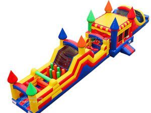 A colorful inflatable obstacle course in the shape of a castle