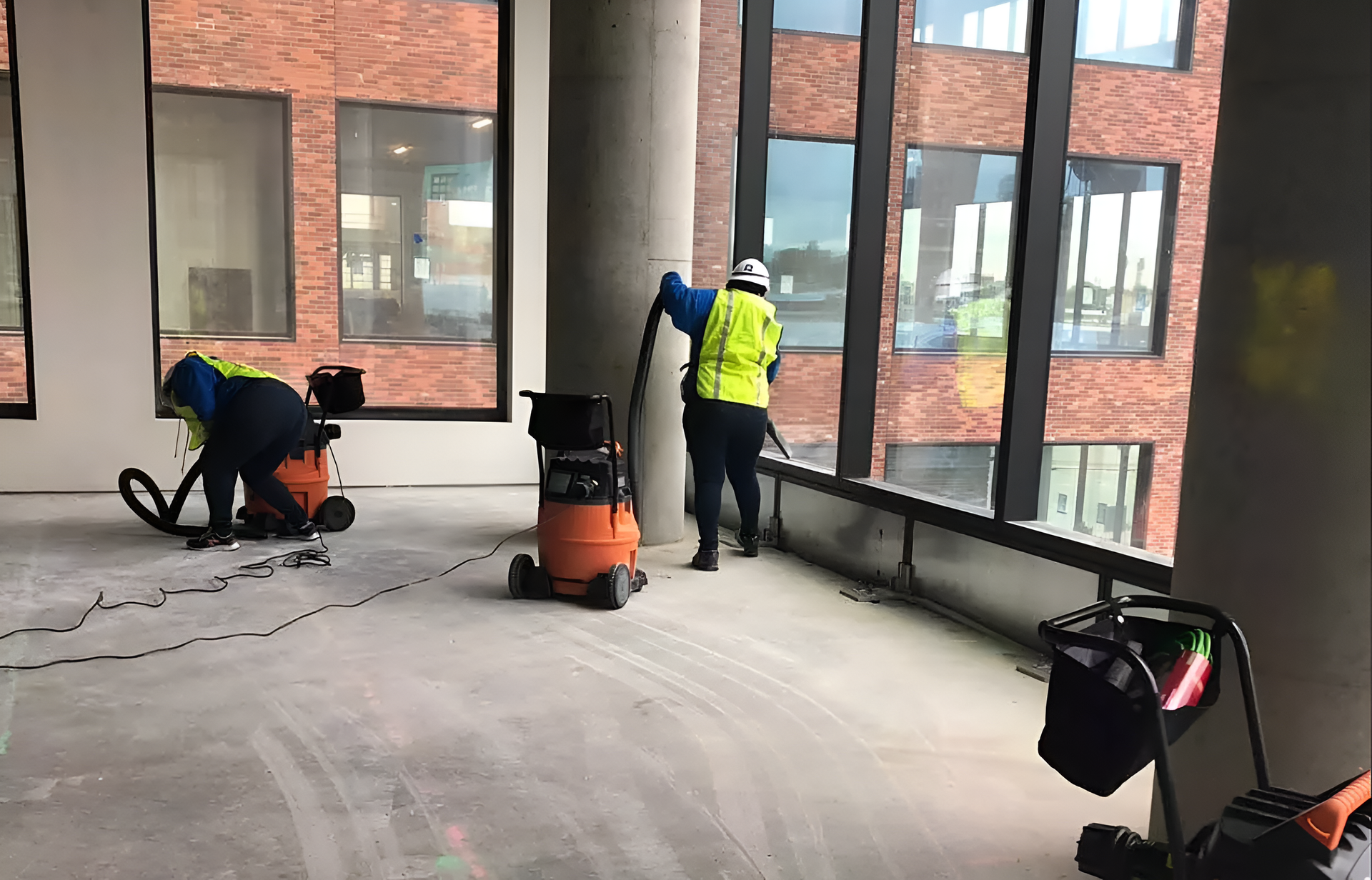 Cherry-stained cabinets and granite countertops in a spacious kitchen with an island.