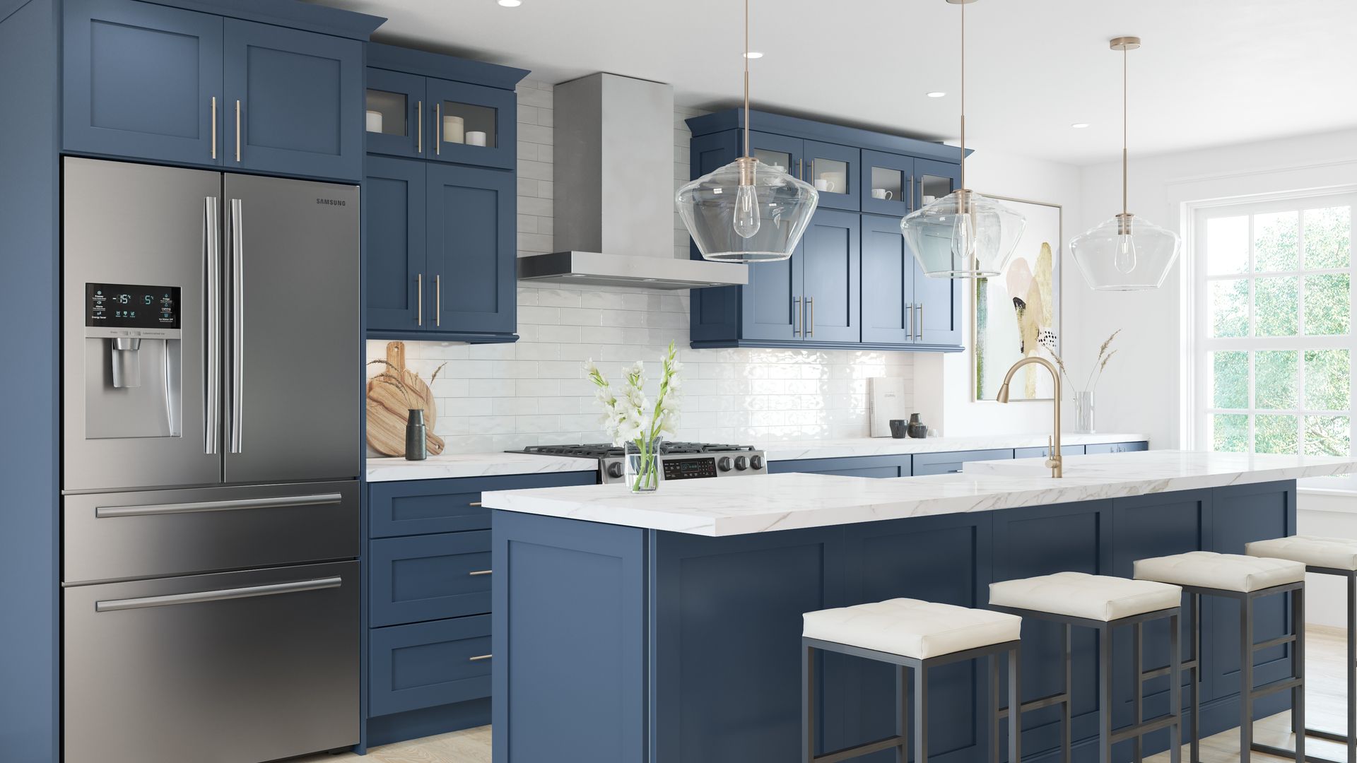 Modern blue kitchen with island, stainless fridge, white countertops, and bar stools by a bright window.