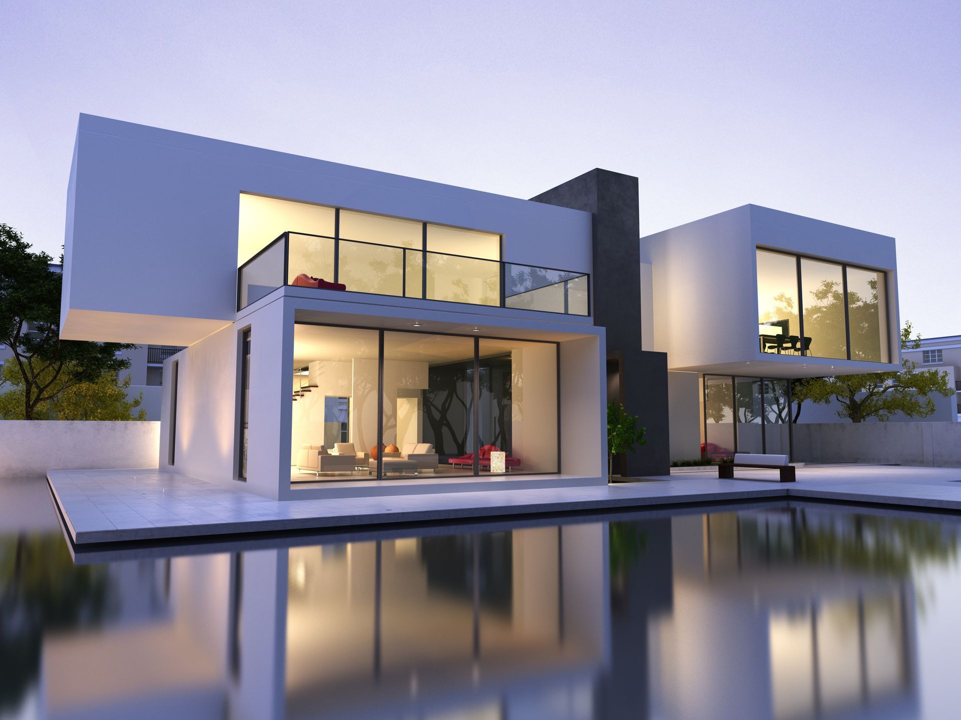 A modern house with a swimming pool in front of it