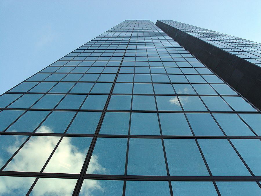 A tall building with a blue sky in the background