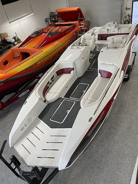 orange and white boat