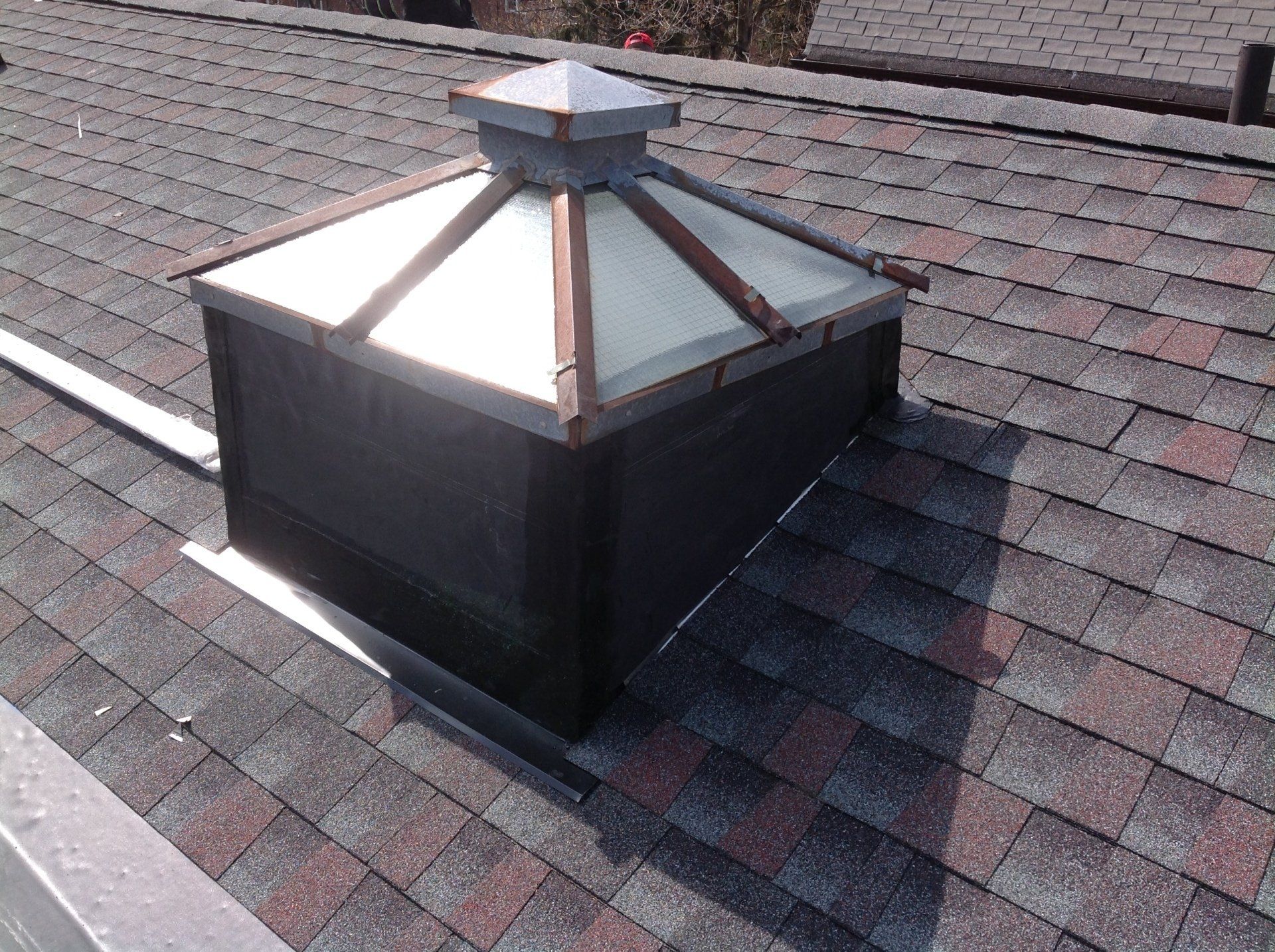 A roof with a light on top of it