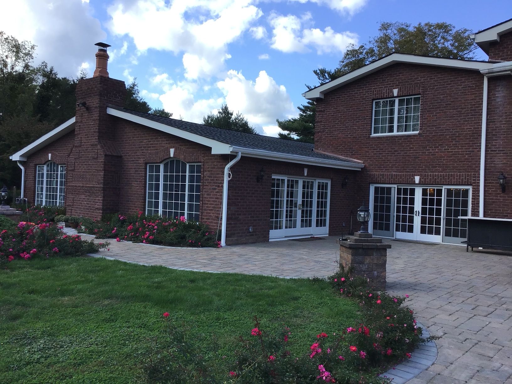 A large brick house with a lot of windows