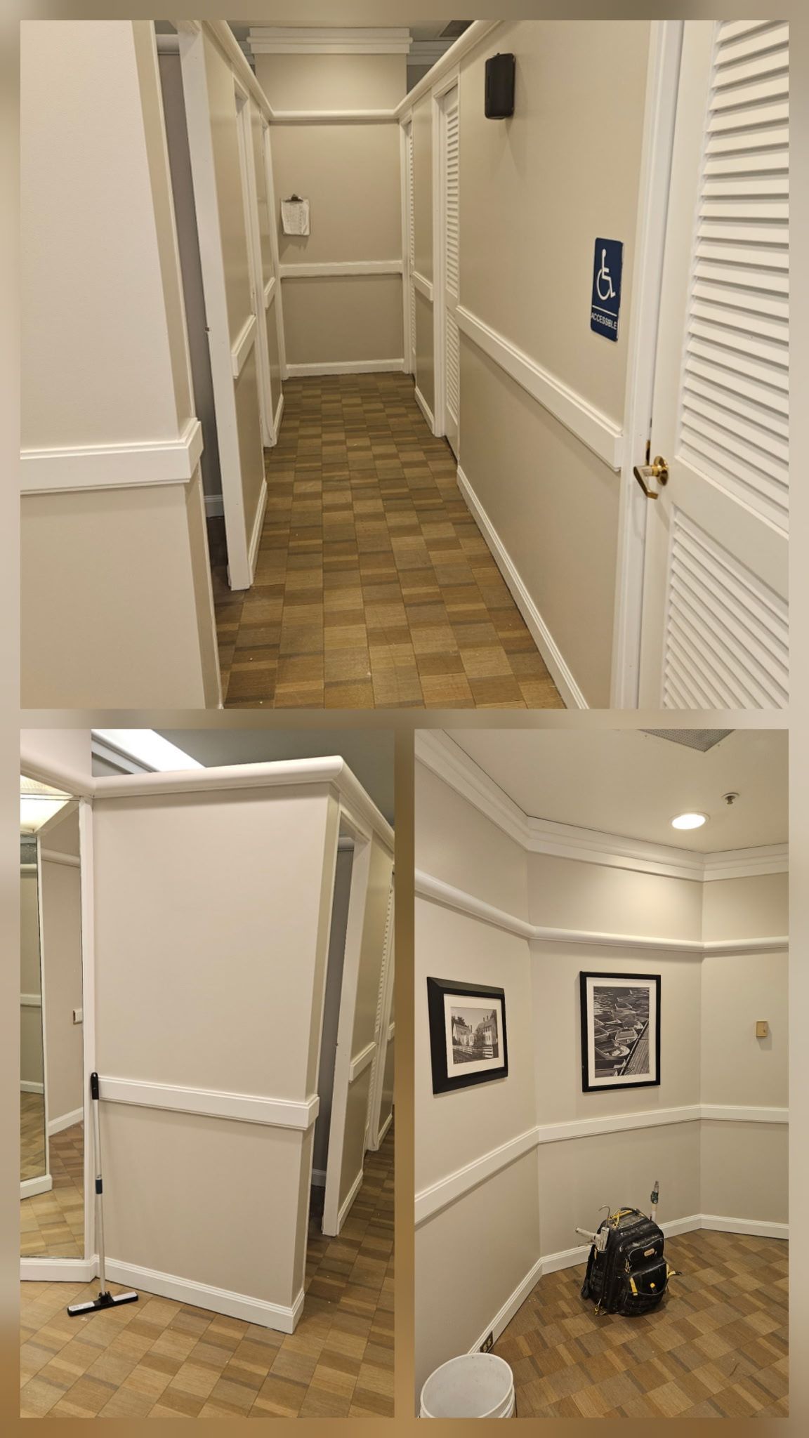 Public restroom with stalls, handrails, and a sign. Beige and white tones.