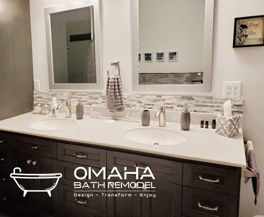 A bathroom with two sinks , two mirrors and a bathtub.