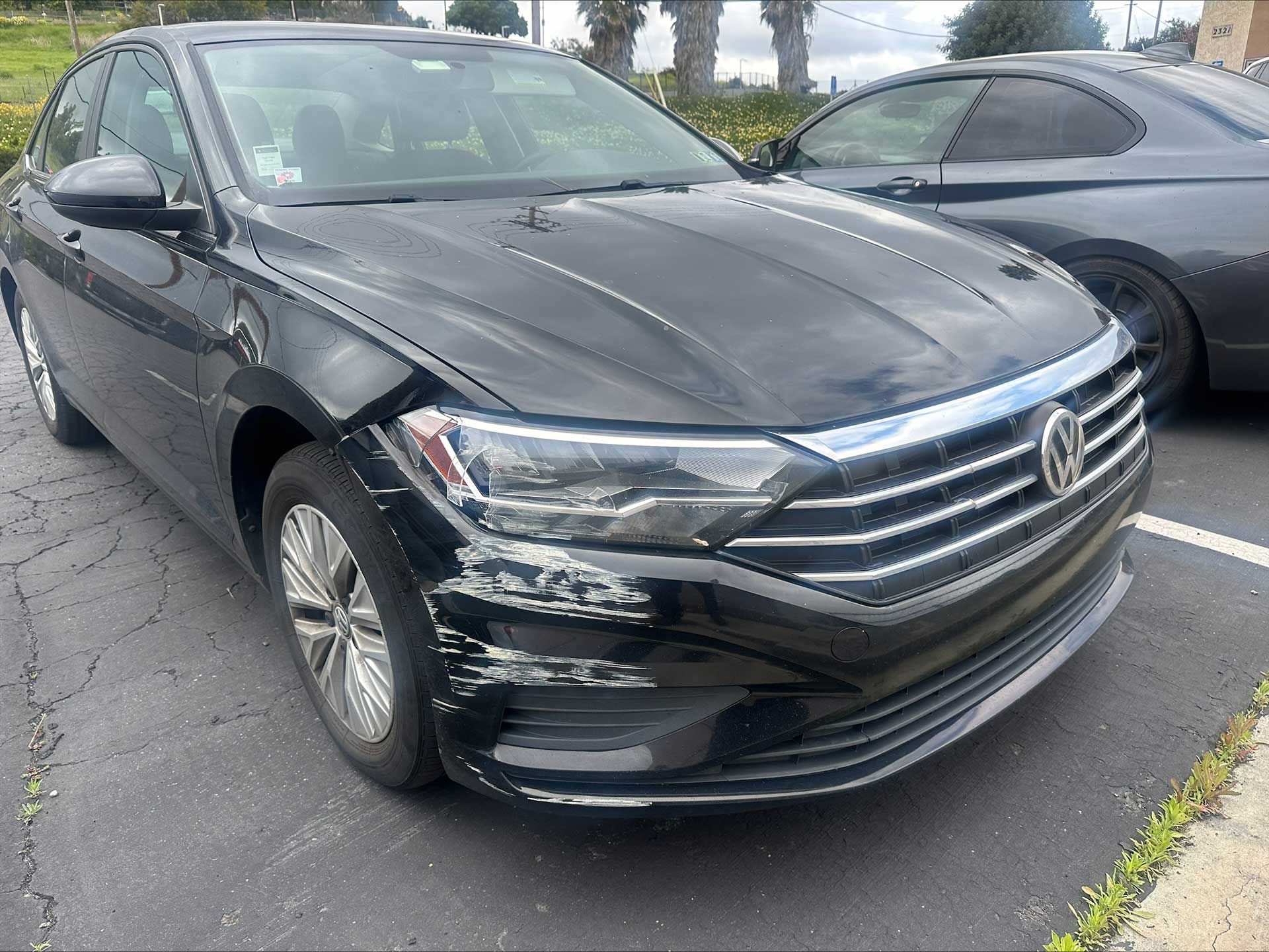 before - collision repair of Volkswagen sedan