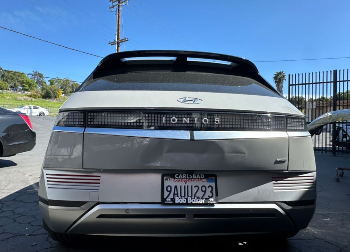 A hyundai ioniq 5 is parked in a parking lot.