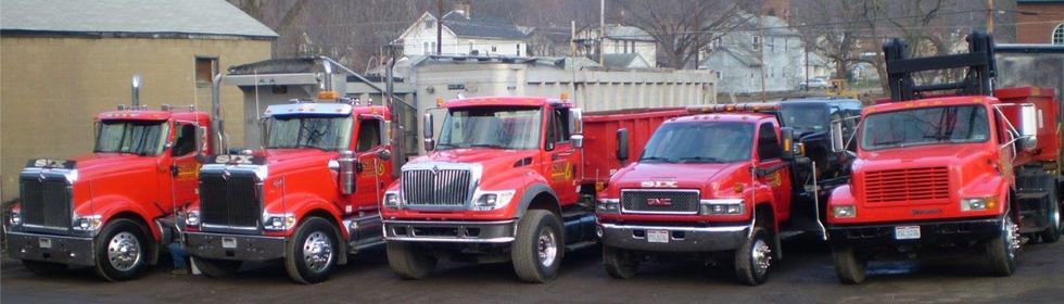 Six Recycling red trucks