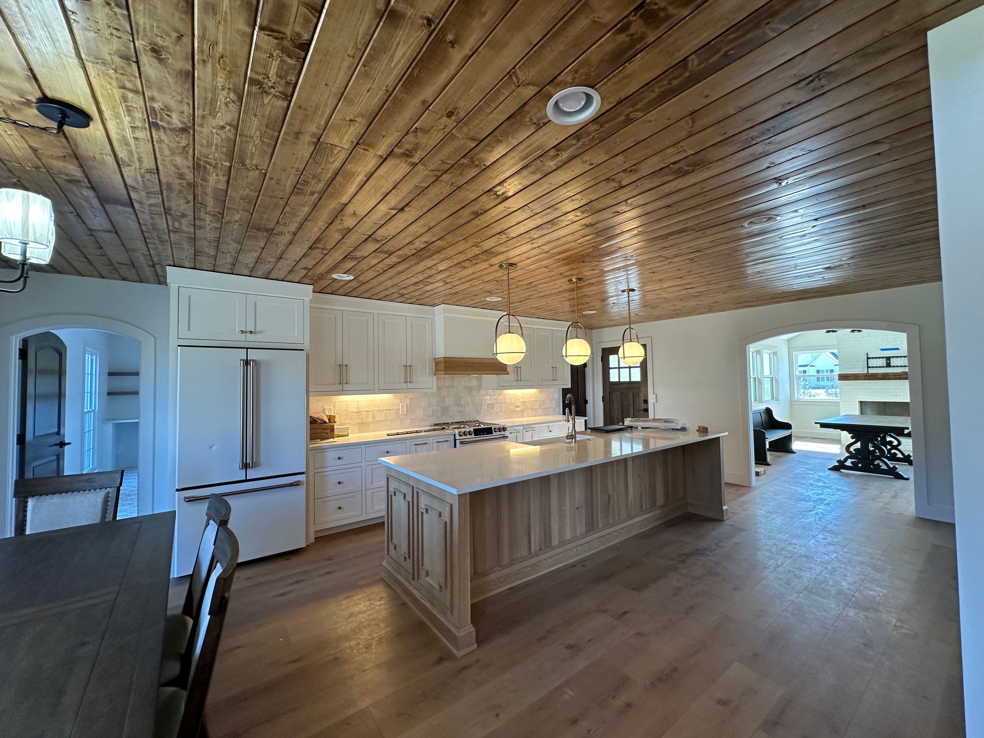 There is a large island in the middle of the kitchen.