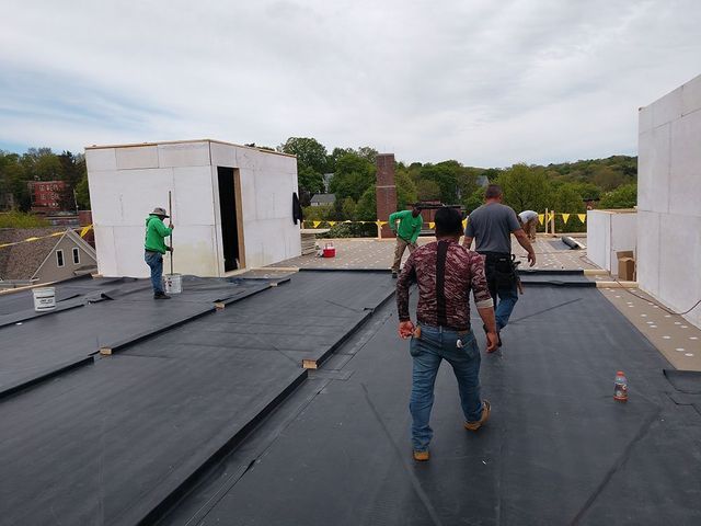 Peoples working on roof