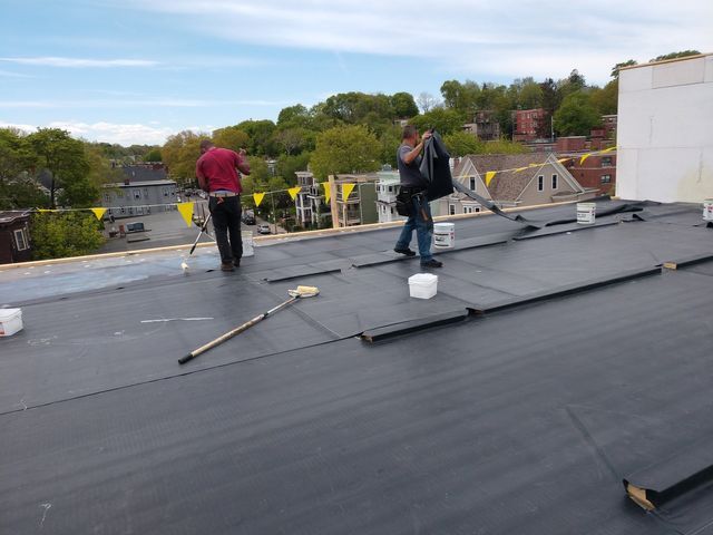 Peoples working on roof