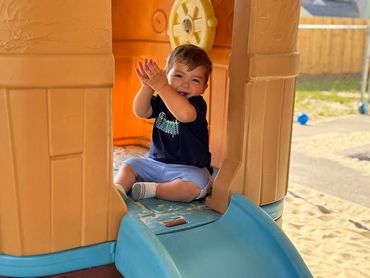 Happy toddler playing
