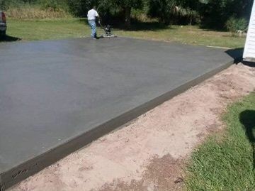 back view of a man at cement work