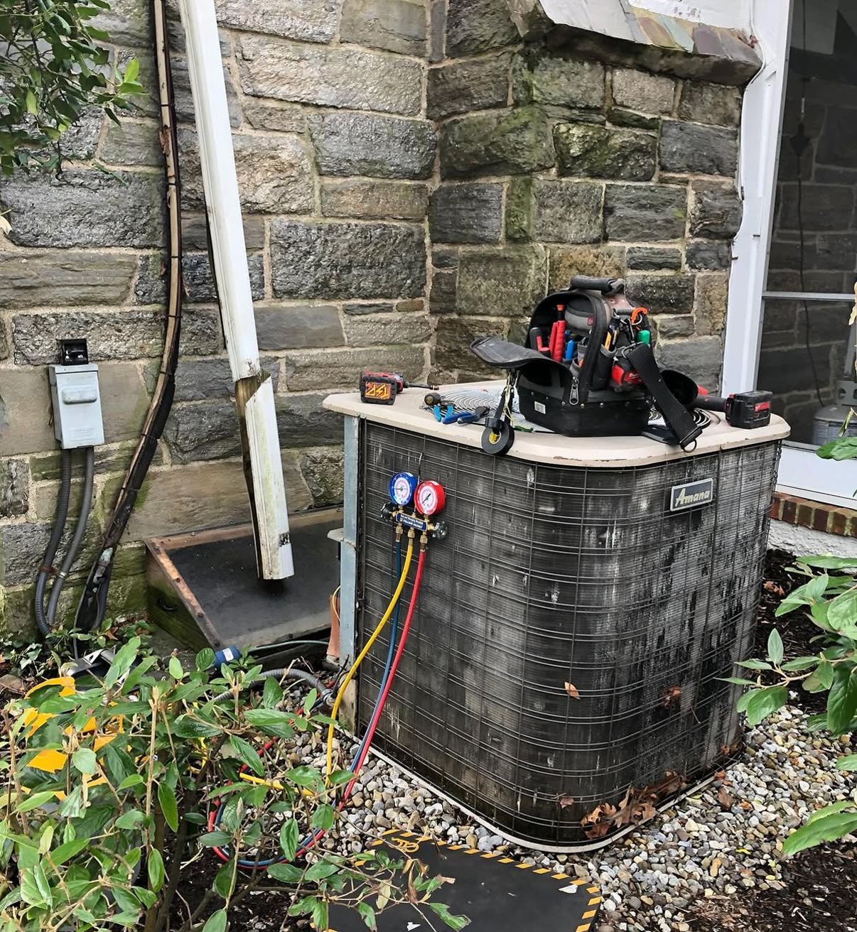 Outdoor AC unit before replacement