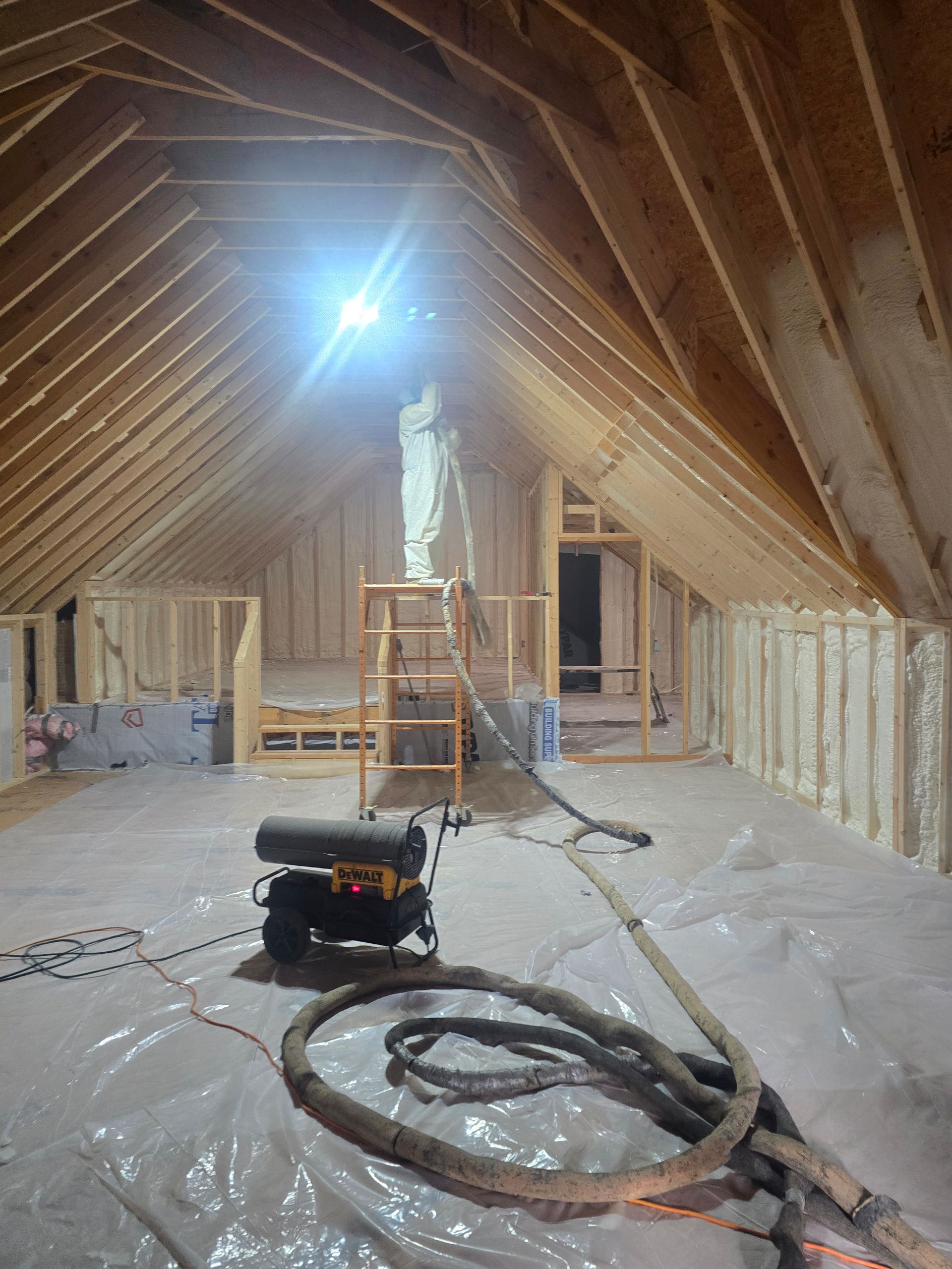 Attic walls have insulation foam.