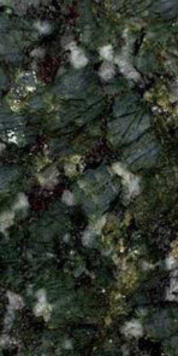 A close up of a green granite counter top.