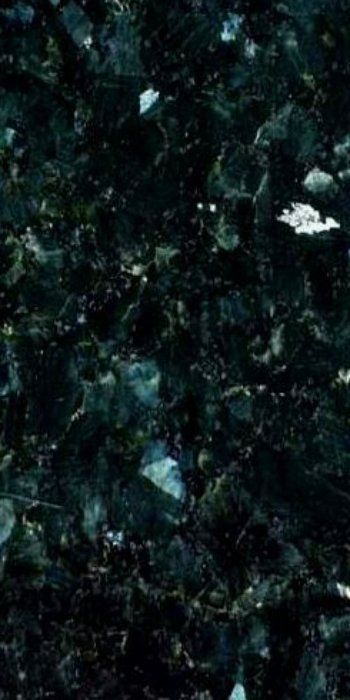 A close up of a black granite counter top.