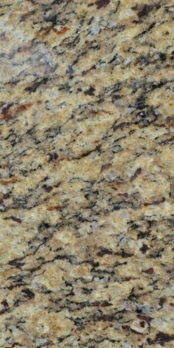 A close up of a yellow granite counter top.