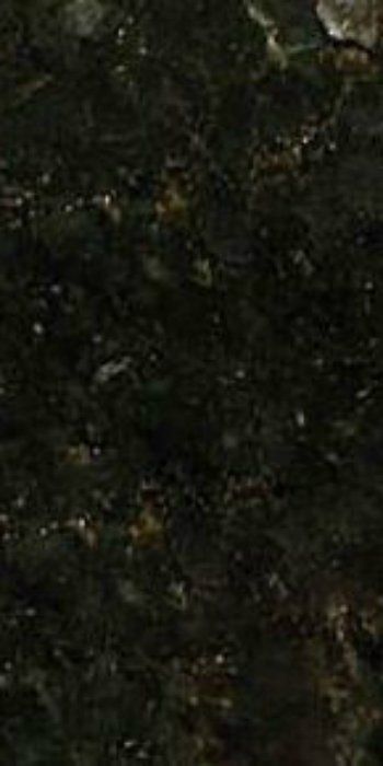 A close up of a black granite counter top.