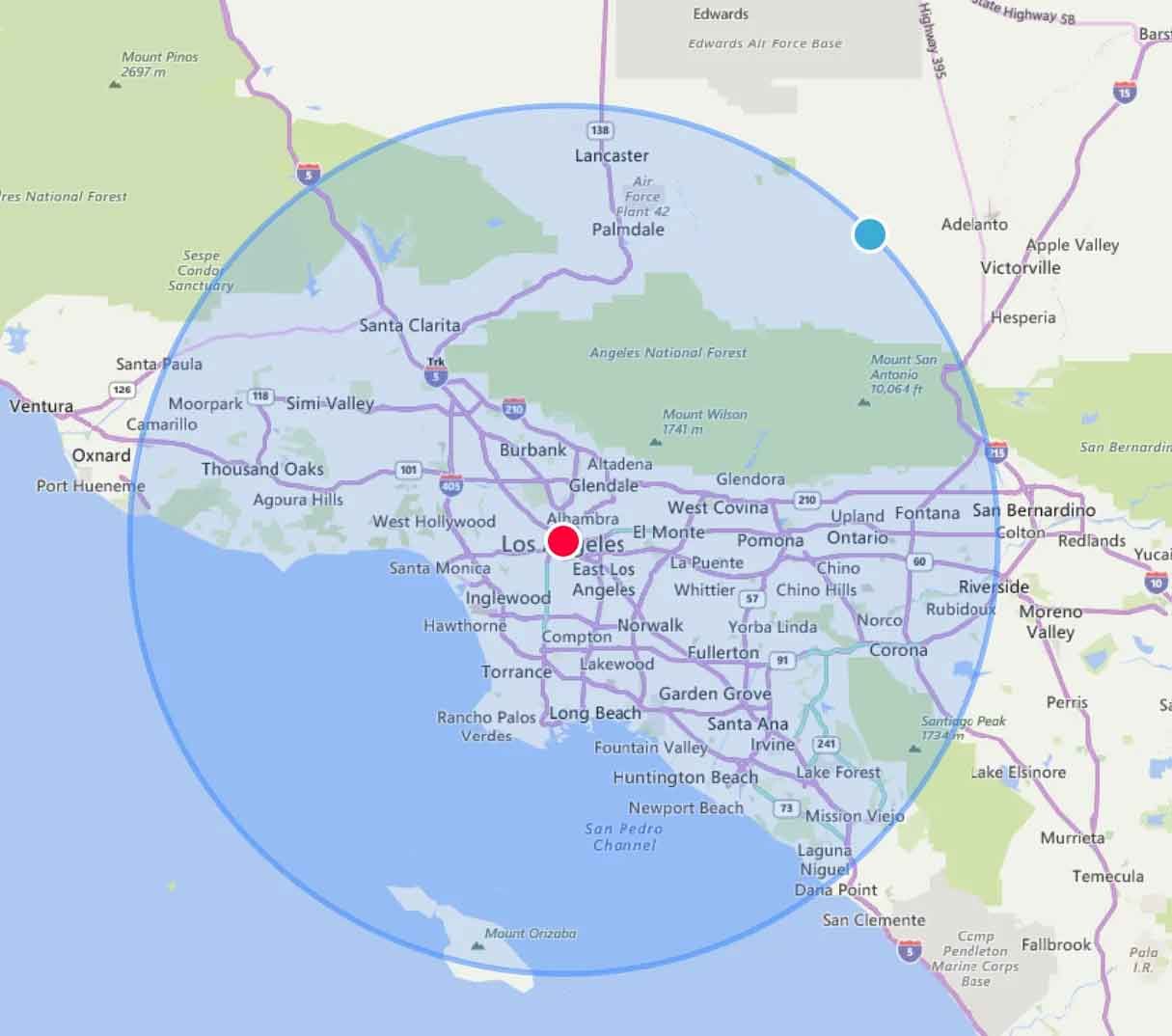Map of Los Angeles with a red dot, blue circle, and a blue dot, highlighting a region.