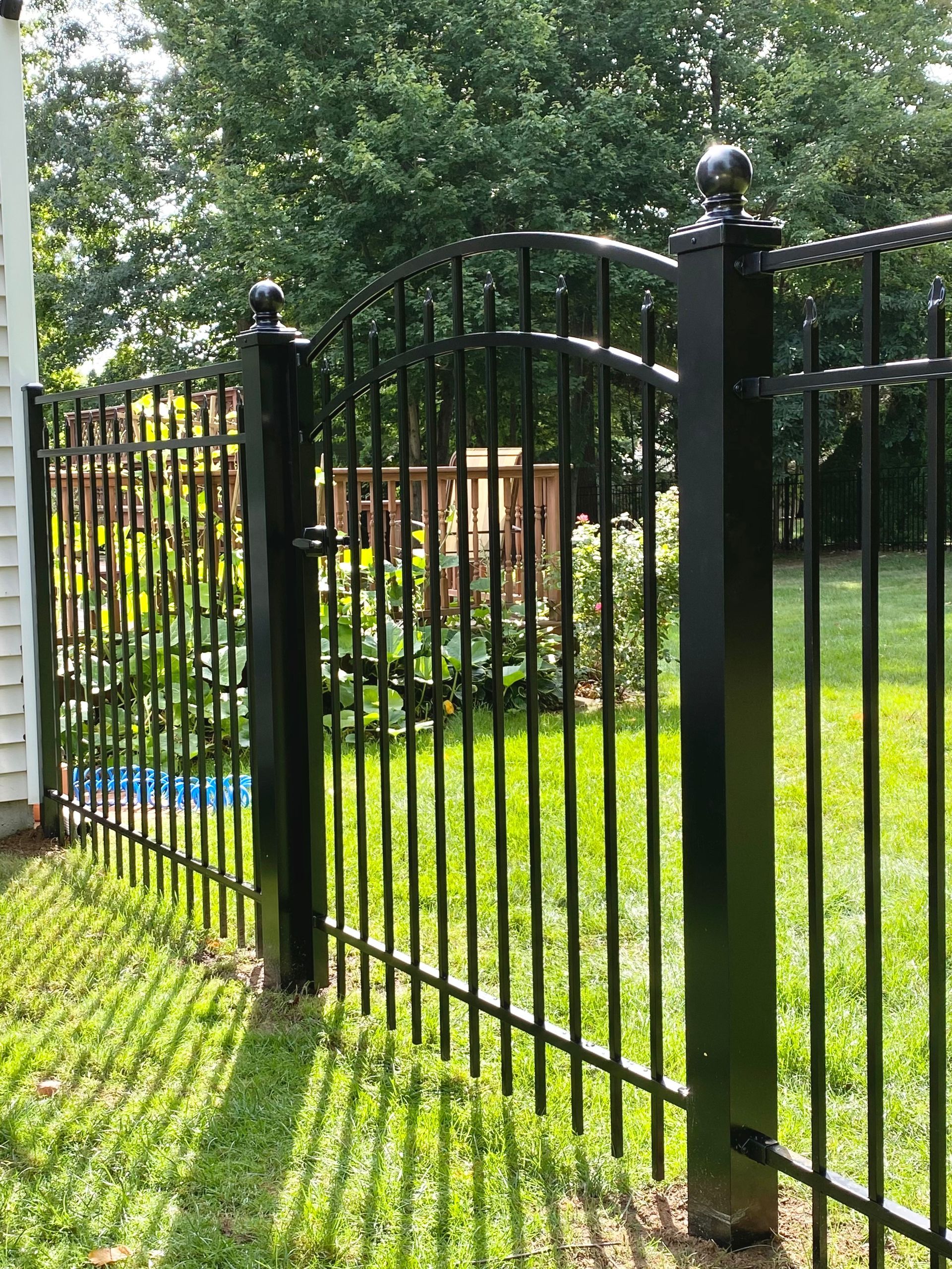 woodgrain vinyl fence