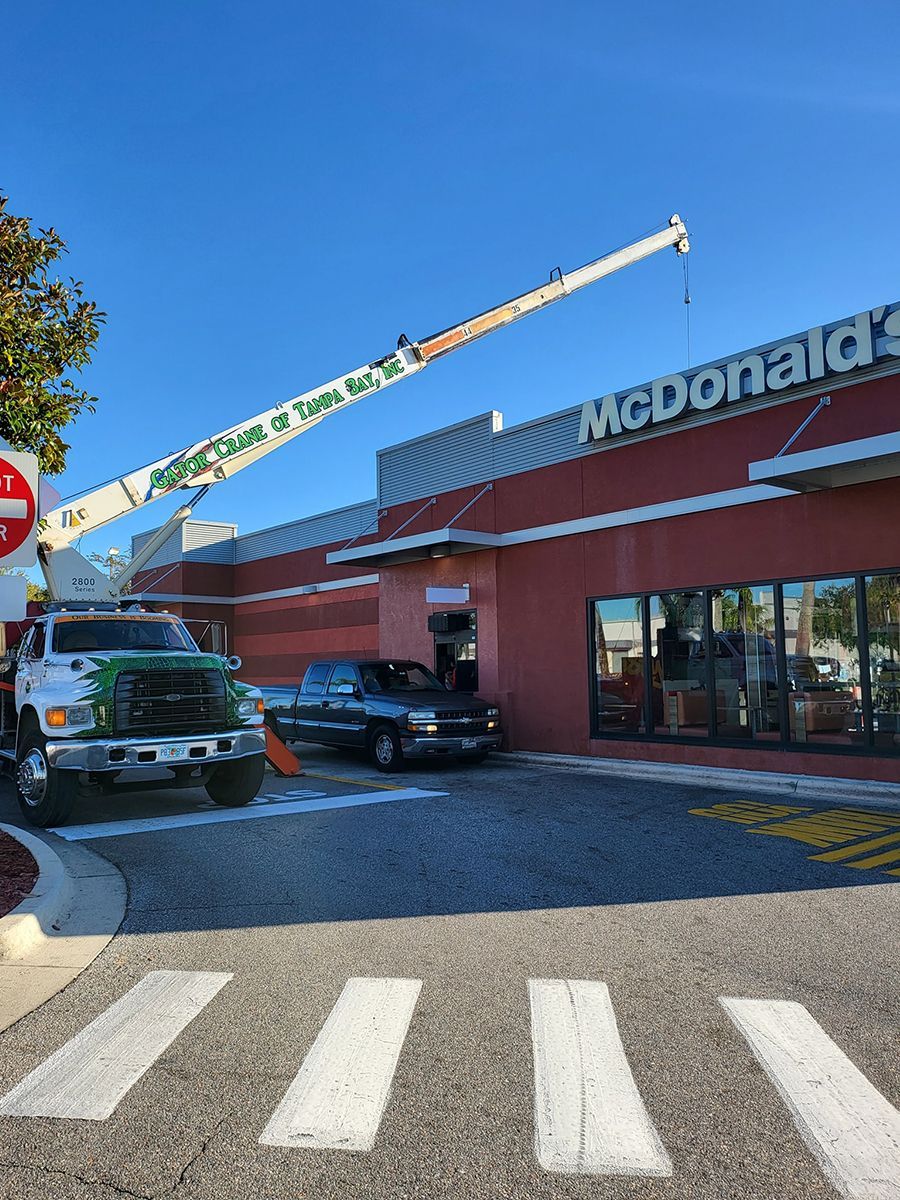 A truck is parked in front of a mcdonald 's