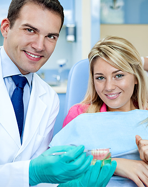 Dentist with a female patient