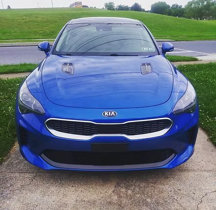 Blue Kia car