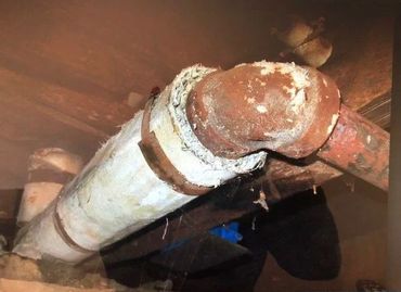 Pipe covered by asbestos coating