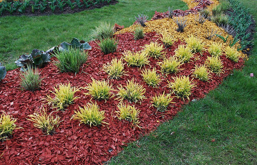 Flower bed with red mulch