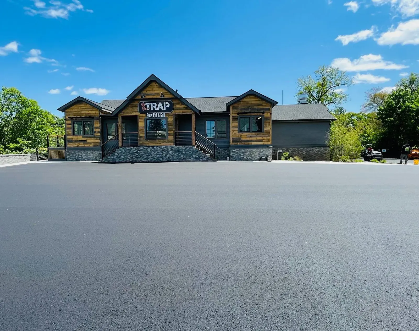A wooden building with a sign that reads 
