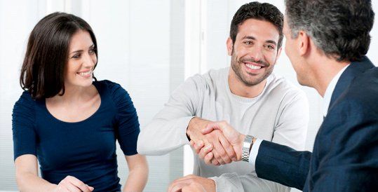 Attorney discussing with clients