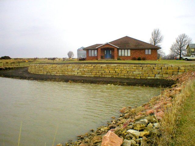 House with retaining wall