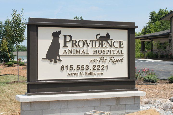 A sign for providence animal hospital and pet resort