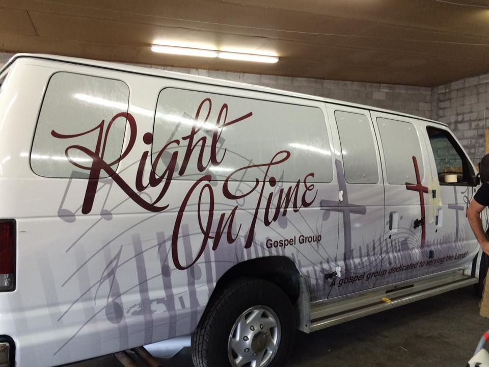 A white van with the words right on time written on it