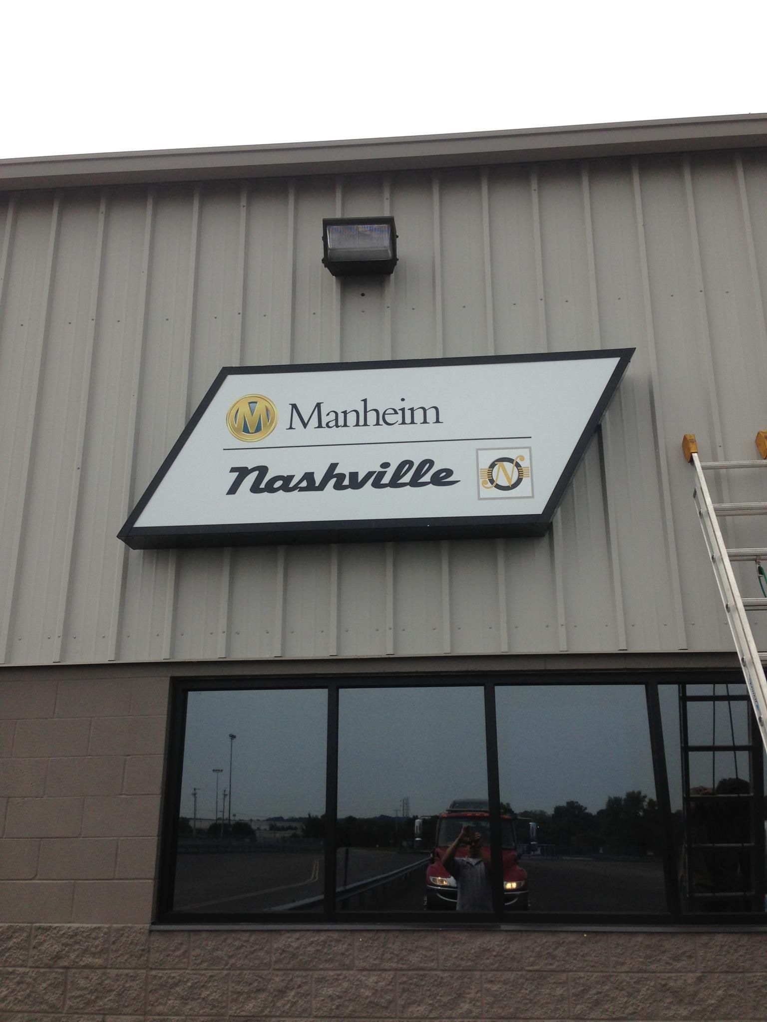 A sign on the side of a building that says nashville