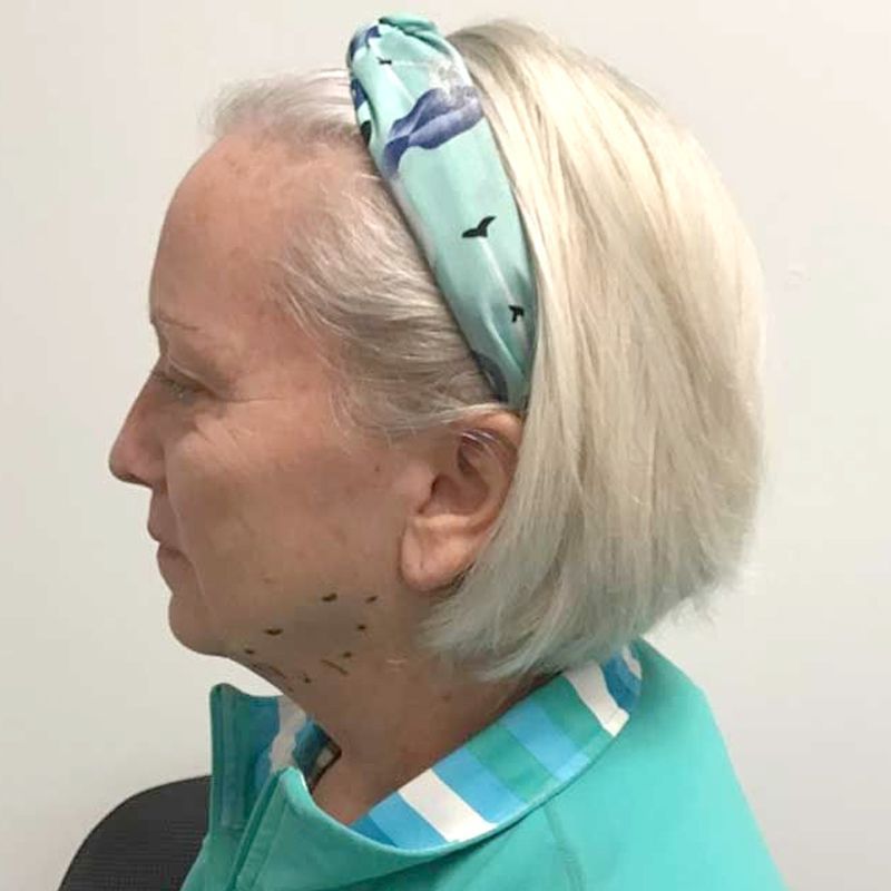 A woman wearing a headband with birds on it