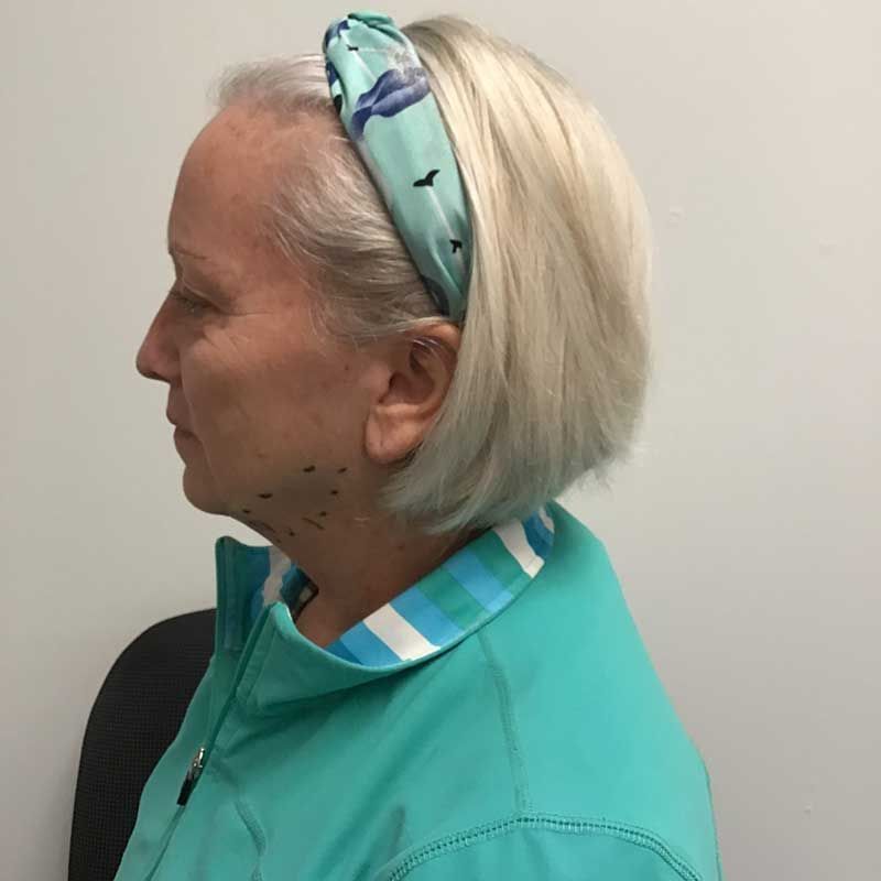 A woman wearing a headband with birds on it